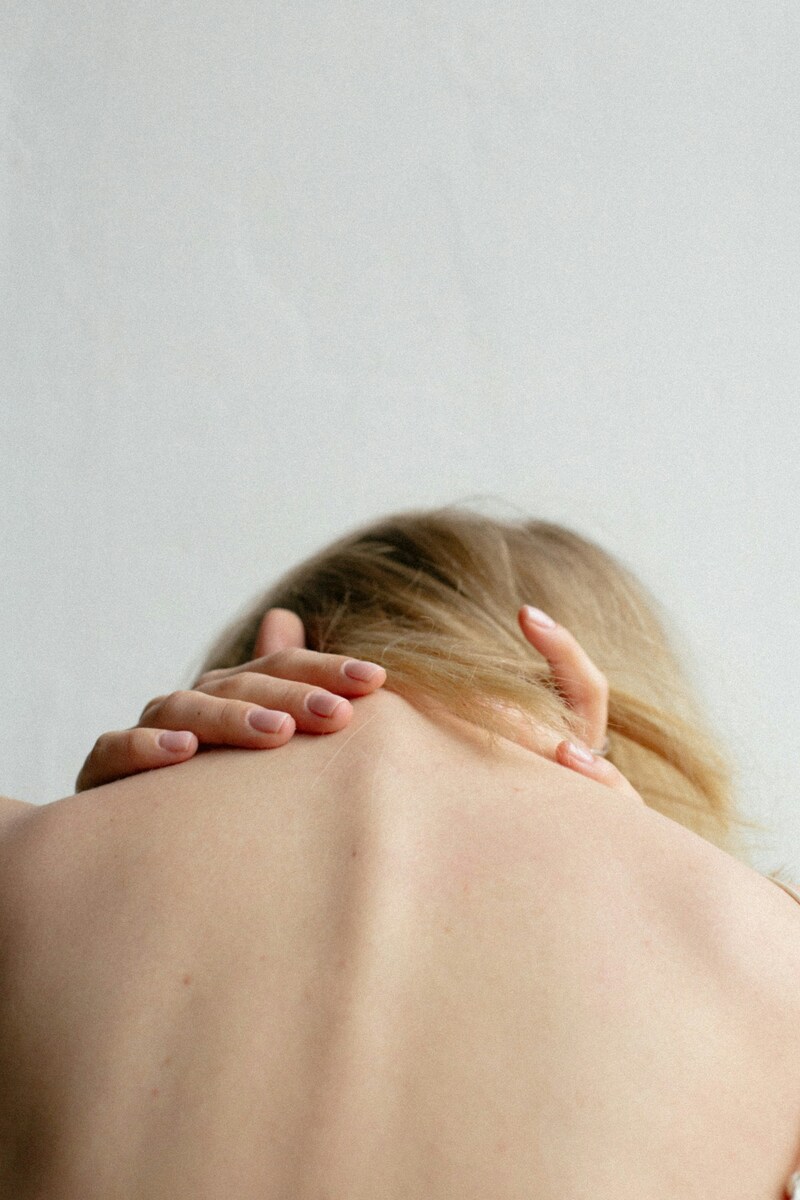 Woman covering with her hand photo