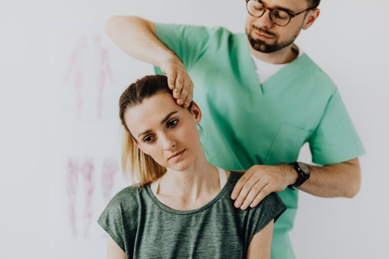 A chiropractor performs therapeutic neck adjustments on a patient for pain relief.